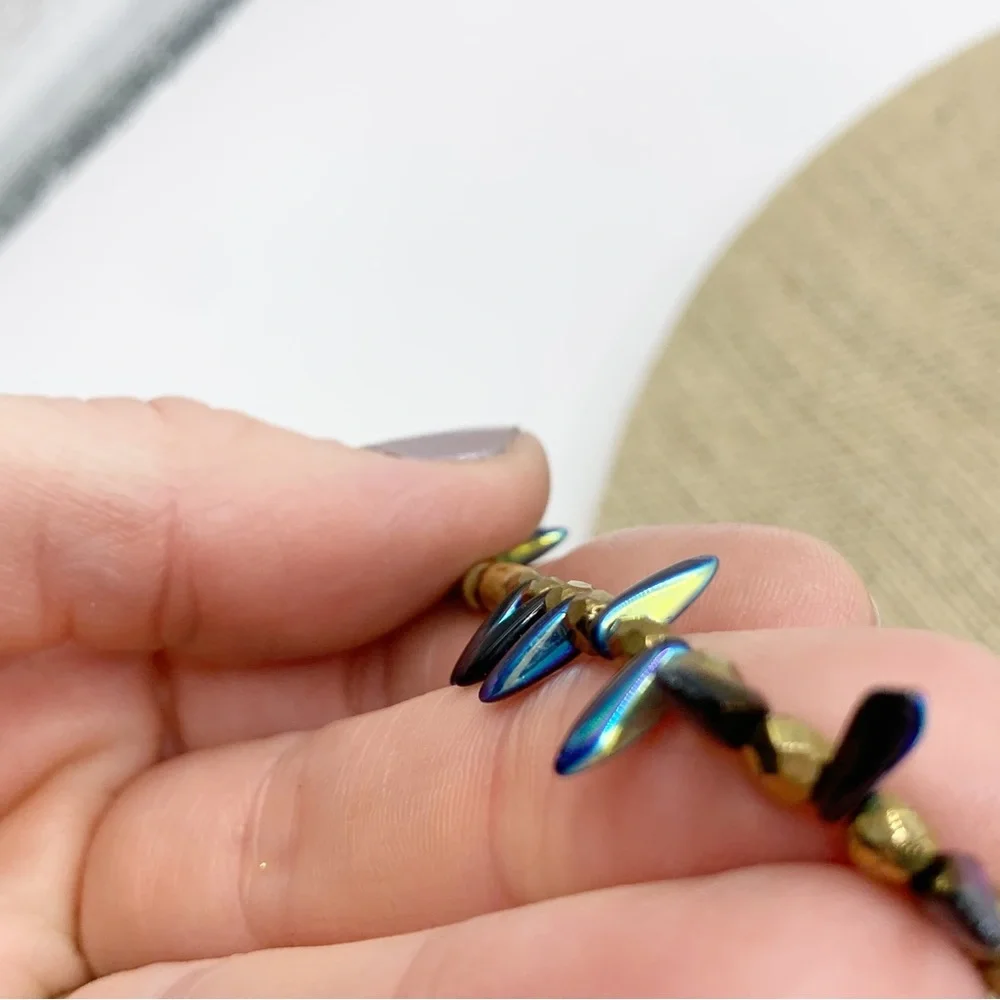 Blue, gold, wood and peacock iridescent faceted dainty Briolette bead necklace